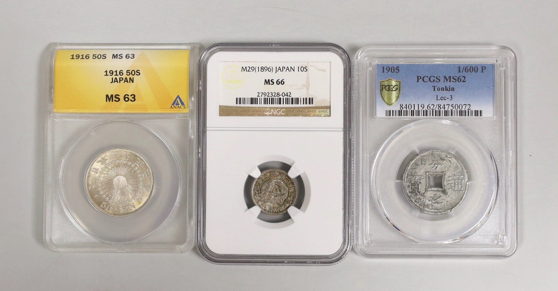 Japan coins, 10 sen 1896, NGC slab, MS66, scarce in this grade, 50 sen 1916, ANACS slab, MS63, scarce in this grade, and French Protectorate, Tonkin 1/600th piastre 1905, PCGS slab, MS62